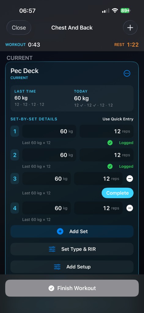 GymLoad active workout logging Pec Deck sets with last time versus today, a rest timer and a Complete button
